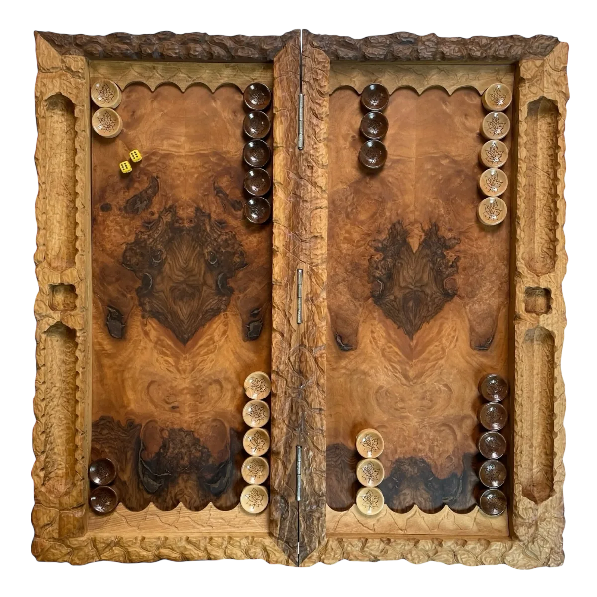 Fully open carved backgammon board with a symmetrical walnut burl playing surface and arranged light and dark checkers