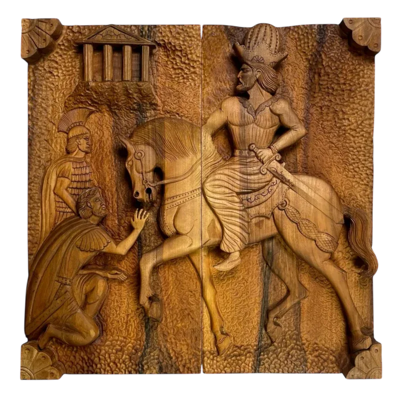 Carved relief on the backgammon board's exterior depicting a temple, soldiers, a kneeling figure and a crowned horseman